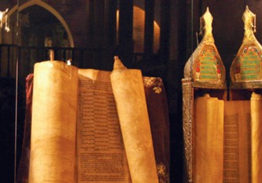 TORAH SCROLLS from the Iraqi Jewish community on display at the Babylonian Jewish Heritage Center